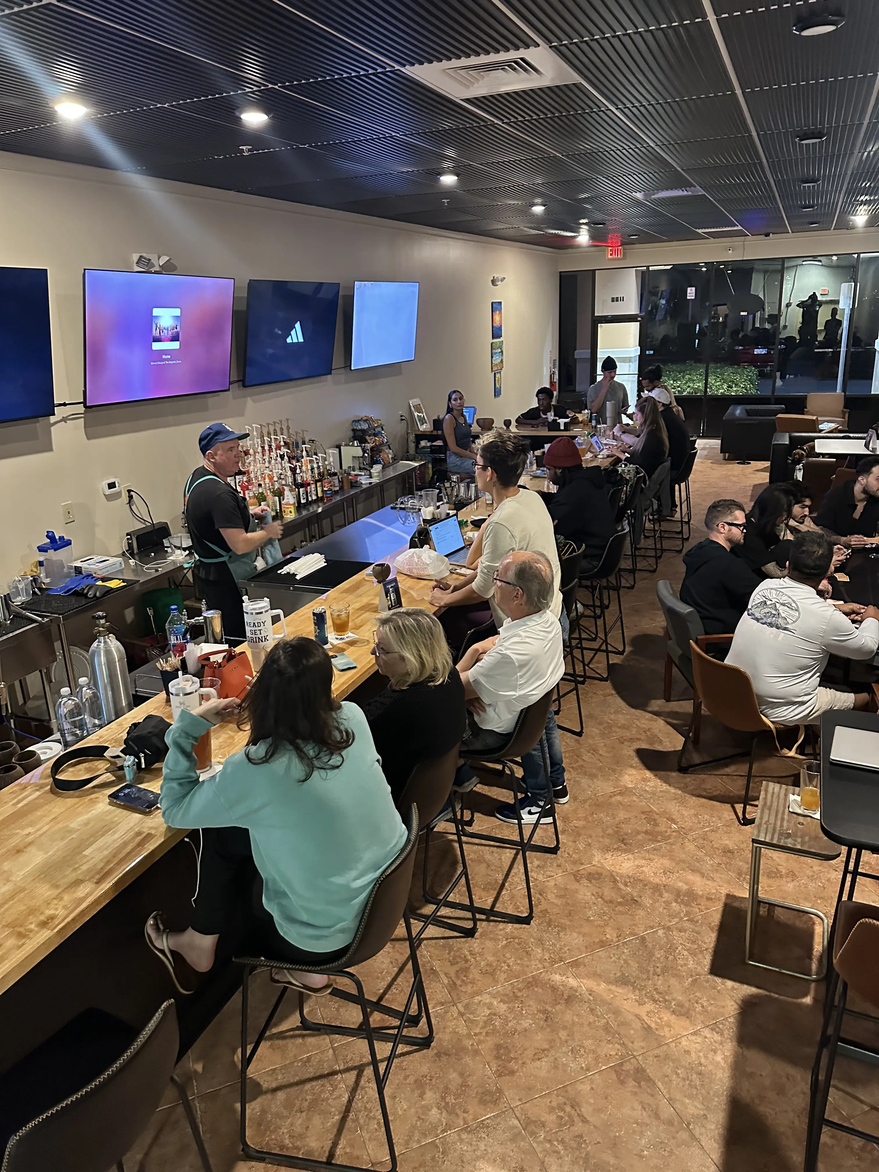 Guests socializing at Piper's Pit Kava Lounge in Sanford
